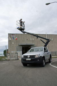 New Safe Truck Mounted lift reaching high